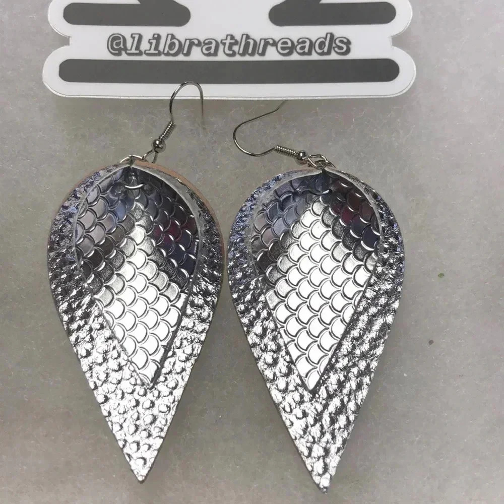 5/$20 silver patterned layered faux leather earrin